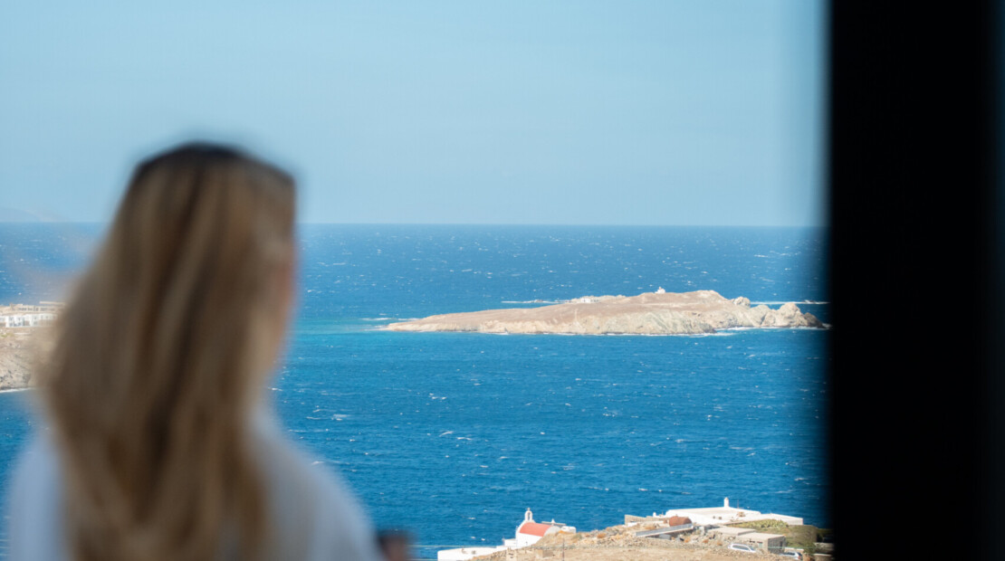 Panorama Two-Bedroom Suite Sea View — Tharroe of Mykonos Hotel with living room and sea views.