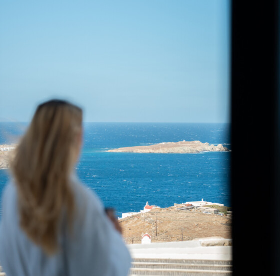 Panorama Two-Bedroom Suite Sea View — Tharroe of Mykonos Hotel with living room and sea views.