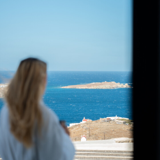 Panorama Two-Bedroom Suite Sea View — Tharroe of Mykonos Hotel with living room and sea views.